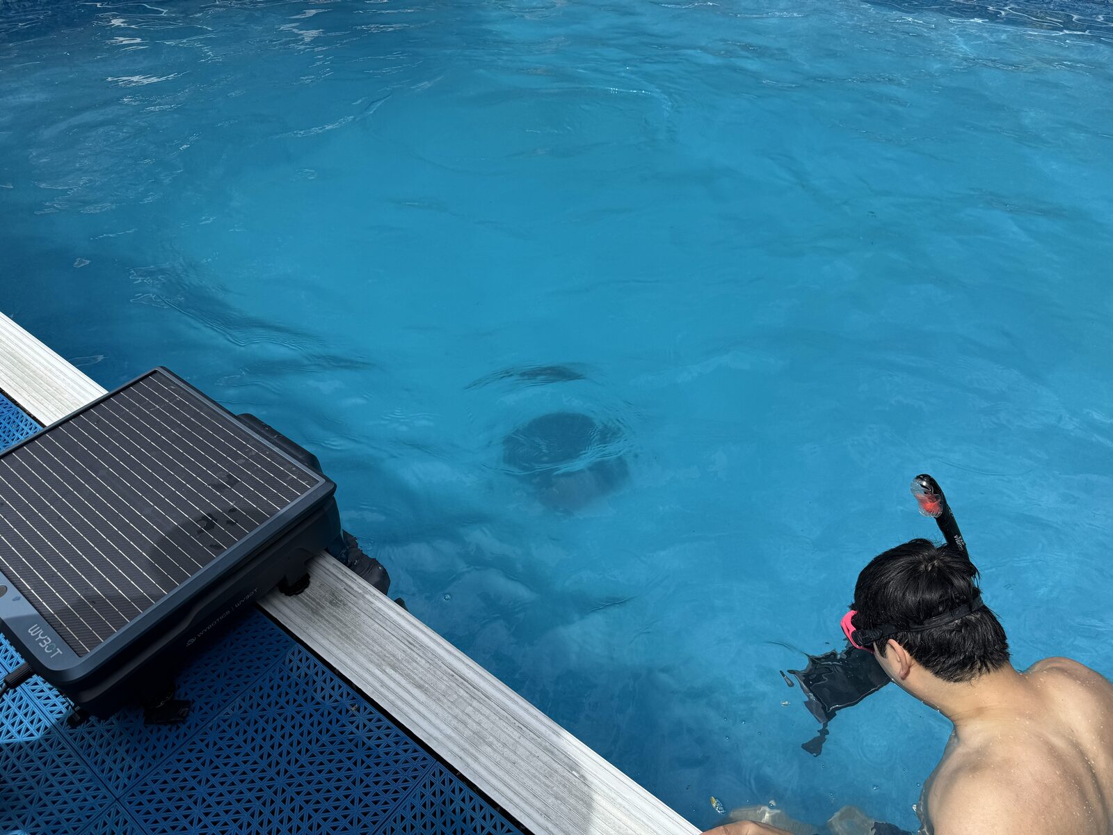 Product photography shoot of a robotic pool cleaner